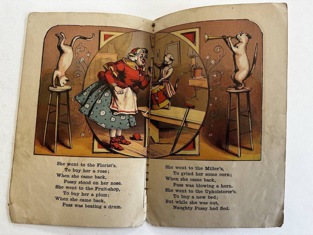 Dame Trot Comical Cat sews drums 1869 McLoughlin color litho moral picture book